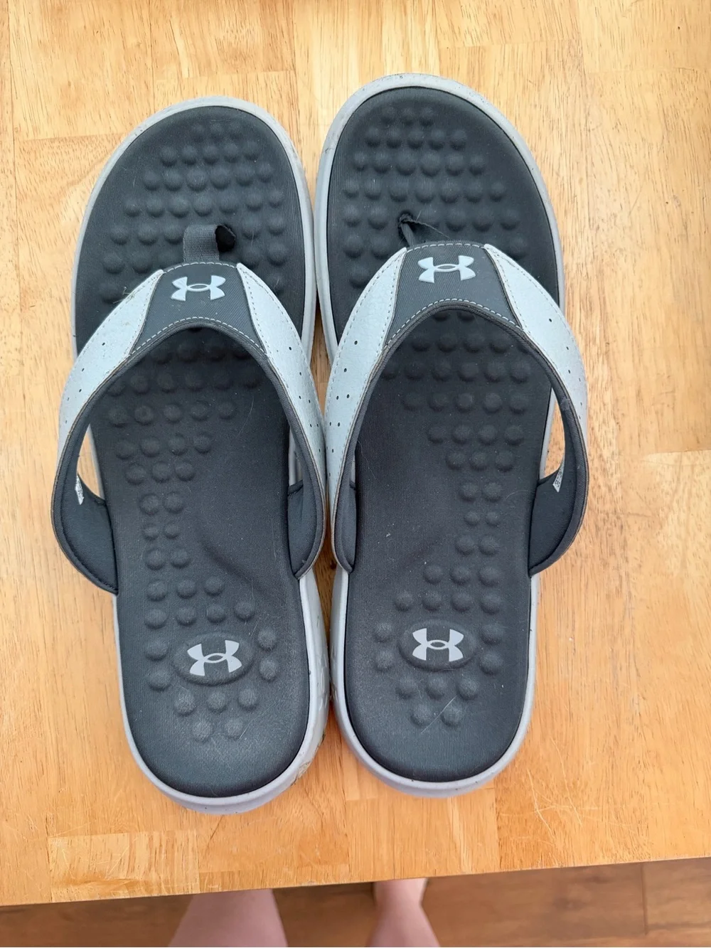 Under Armour men’s flip flops. Size 12. Worn once.